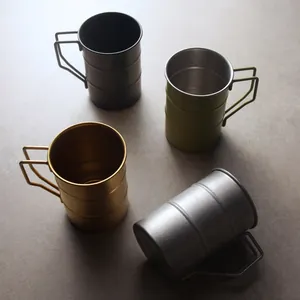 Set of four vintage 304 stainless steel camping mugs with folding handles in assorted colors