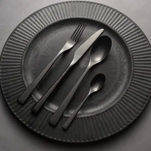 Professional vintage matte black 304 stainless steel cutlery set with knife, fork, and spoons