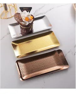 Detailed view of elegant hammered stainless steel trays in silver, gold, and rose gold finishes.