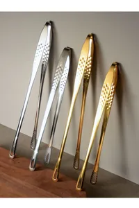 Detailed view of long-handle stainless steel food tongs in silver and gold finishes