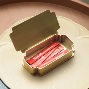 Portapalillos de lujo de acero inoxidable dorado con tapa abatible para restaurante