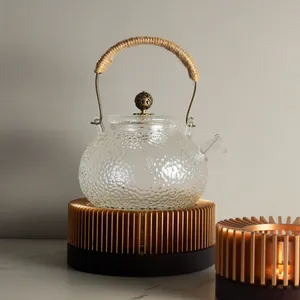 Elegant wooden candle heated teapot warmer base with a hammered glass tea kettle