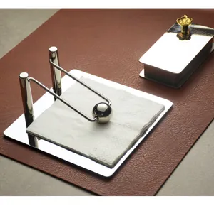Polished stainless steel napkin holder set with decorative golden flower toothpick box