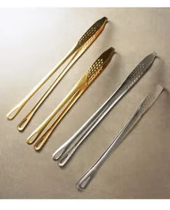 Detailed view of 304 stainless steel BBQ tongs in gold, copper and silver finishes.