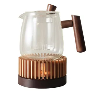 Minimalist glass teapot set with wooden handle and candle warmer base
