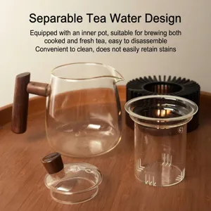 Danish style glass tea warmer set with wooden handle and candle heating base