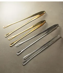 Detailed view of long-handled 304 stainless steel food tongs in gold and silver