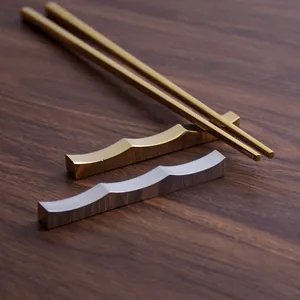 Repose-baguettes élégants en acier inoxydable 304 avec finition miroir or et argent.