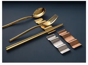 Hammered stainless steel cutlery rest detail showing gold, silver and rose gold finishes