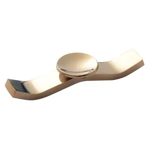Minimalist 304 stainless steel Ruyi chopstick and spoon rest with elegant gold finish