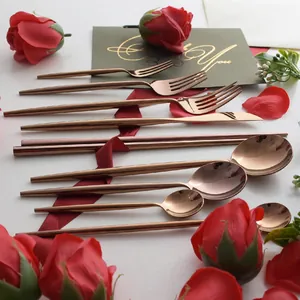 Mirror finish rose gold stainless steel cutlery set including knife, fork and spoon