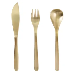 Elegant retro gold stainless steel cutlery set including willow-leaf knife, fork, and spoon.