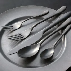 Vintage matte grey stainless steel cutlery set with steak knife, fork and coffee spoon