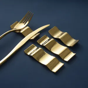 Elegant gold stainless steel wavy cutlery rest set with hammered and mirror finish texture
