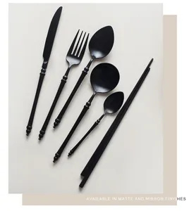 Detailed view of matte black 304 stainless steel cutlery set with bamboo design