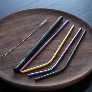 Set of reusable 304 stainless steel straws in assorted colors with a cleaning brush
