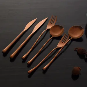 Premium vintage rose gold stainless steel cutlery set including steak knives forks and spoons