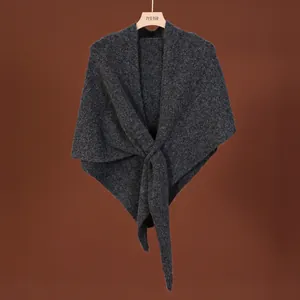 Elegant dark grey wool blend knit shawl featuring a stylish cross-tie front detail