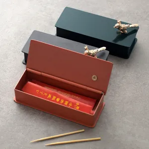 Luxury stainless steel toothpick box with golden bird ornament for home decoration