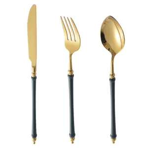 Retro emerald and gold stainless steel cutlery set including knife, fork, and spoon