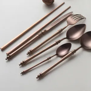 Elegant rose gold 304 stainless steel cutlery set with bamboo inspired handle design