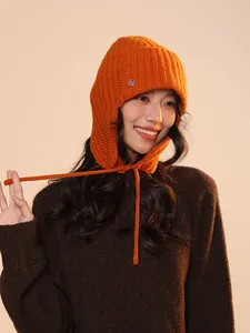 Vibrant orange 100% wool knitted balaclava hat with ear flaps and adjustable ties.