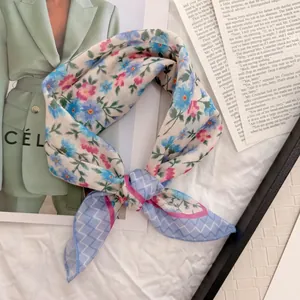Close-up of vintage floral cotton-linen scarf with delicate pastoral print details