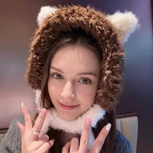 Stylish cute cat ear plush earmuffs with adjustable tie straps for women in brown and white.