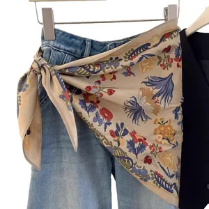 Vintage floral print triangular silk scarf styled as a stylish waist accessory for women
