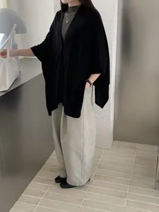 Elegant minimalist black retro Chinese style knit shawl for autumn outfit styling