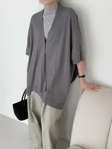 Elegant grey knit shrug shawl for women styled with a minimalist autumn outfit view
