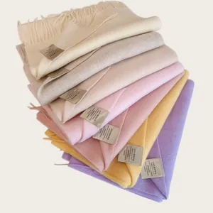 Soft 100% Australian wool scarves in various pastel colors showing premium texture
