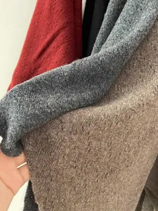 Close-up of 100% Australian wool knitted triangle shawl texture and multiple colors