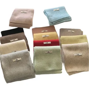 Soft solid color ribbed knit scarves in multiple autumn winter colors
