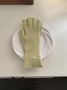Elegant pale green ribbed knit winter gloves for women with warm thermal material