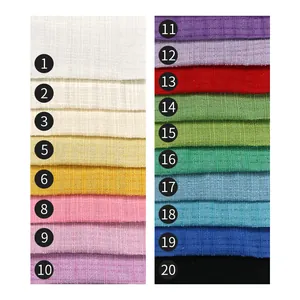 Detailed view of colorful tweed fabric swatches with checkered patterns for clothing