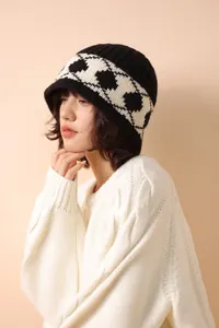 Detailed view of Nordic retro diamond pattern on a thick 100% wool knitted beanie
