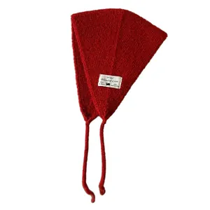 Vintage red knitted wool blend ear warmer headband featuring a chic tie-on design