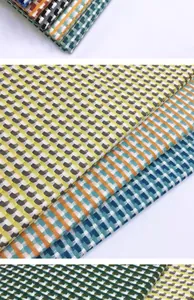 Detailed view of multi-colored fish scale check cotton-linen jacquard fabric textures