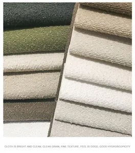 Close-up of multi-color teddy velvet boucle fabric swatches showing thick granular texture