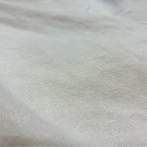 High-quality white cotton linen fabric texture with a natural woven pattern detail