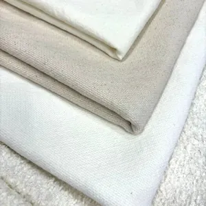 Detailed view of high-quality natural cotton and linen fabrics in neutral cream shades