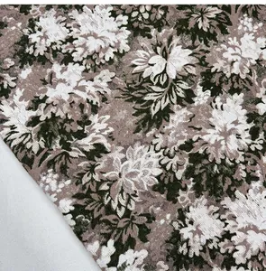 Gros plan sur un tissu jacquard floral vintage avec une texture tissée détaillée