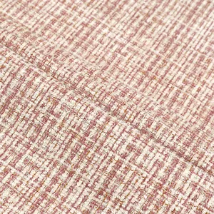 Macro close-up van roze en witte tweed chenille stof met gedetailleerde weeftextuur