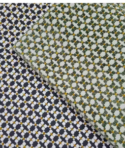 Detailed close-up of premium vintage green jacquard fabric for upholstery and DIY craft