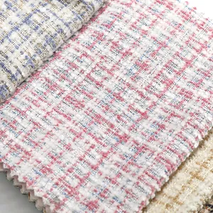 Detailopname van zachte chenille tweed stof met ruitpatroon en geweven textuur