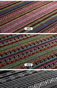 Macro detail of ethnic style woven fabric with colorful geometric striped patterns