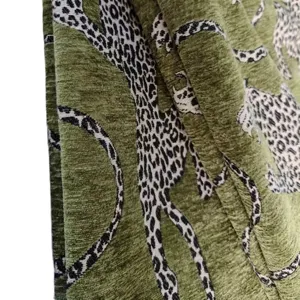Vintage leopard print textile fabric in olive green for pillows cushions and curtains
