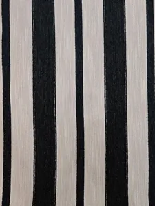 Close-up of black and beige vertical striped chenille fabric for upholstery and bags.