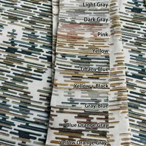 Campioni di tessuto jacquard in ciniglia con motivi geometrici colorati per arredi DIY